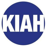White bold text spelling KIAH inside a blue circle which is used as our logo.